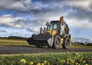 Baggerlader New Holland B115C