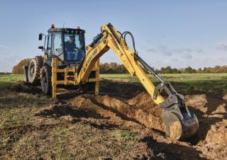 Baggerlader New Holland B115C