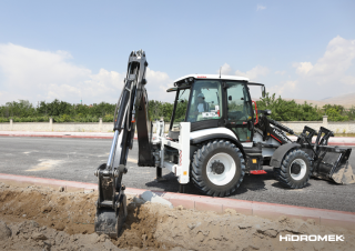 Baggerlader Hidromek HMK 102 B Supra