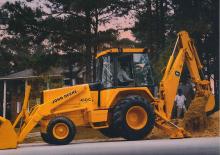 Baggerlader John Deere Construction 710 B