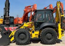 Baggerlader New Holland B115D TC SS