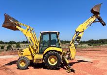 Baggerlader Komatsu WB 140PS-2