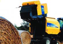 Rundballenpressen New Holland BR7070 Raffer